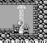 Wario portant une pièce 10 dans Wario Land: Super Mario Land 3