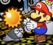 The Puni elder gives Mario the Puni Orb.