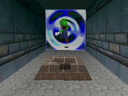 Luigi about to enter the hole leading to Bowser in the Fire Sea.