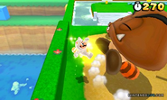 Mario golpeando a un Goomba Tanuki gigante en Super Mario 3D Land