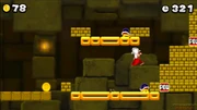 Mario traverses the Golden Caves near some Donut Lifts.