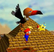 Mario saltando hacia Klepto para quitarle la estrella de poder