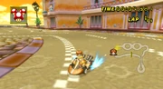 A Mini-Turbo in action as seen in . In most games, the charging of a Mini-Turbo is indicated by blue sparks igniting from the rear wheels.