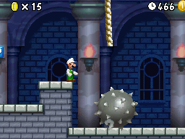 Luigi near a Giant Spiked Ball.