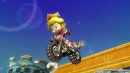Baby Peach riding a bike