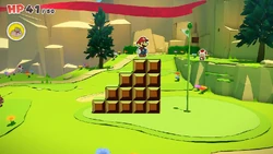 Mario jumping to the Goal Pole in Paper Mario: The Origami King.