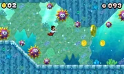 Mario swimming by the Urchins.