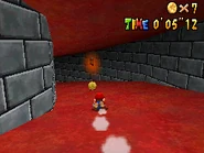Mario traveling down the slide in Super Mario 64 DS