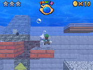 Luigi swimming in Wet-Dry World, collecting Silver Stars in the mission, Soaked Silver Stars.