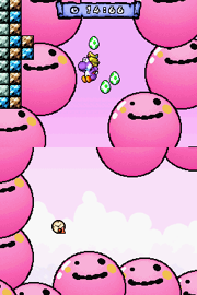 Purple Yoshi making his way between some Bouncies in Yoshi's Island DS
