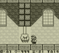 Un poing géant dans Super Mario Land 2: 6 Golden Coins.