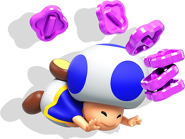 Blue Toad dropping flower coins with a drop shadow behind him