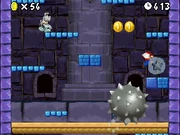 A Giant Spiked Ball rolling as seen in New Super Mario Bros..