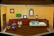Mario inside of an Inn in Paper Mario.