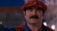 Hoskins as Mario in the 1993 film.