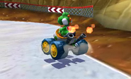 Mario Kart 7 screenshot of Yoshi approaching a turn toward the end of Dino Dino Jungle
