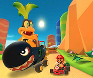 Iggy Koopa driving through Rock Rock Mountain in Mario Kart Tour.