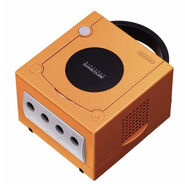An orange Nintendo GameCube console.