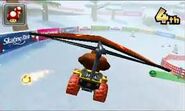 Donkey Kong gliding on DS DK Pass in Mario Kart 7