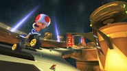 MK8- 3DS Music Park1.png (1.45 MB) Toad, and several other characters, racing on the track.
