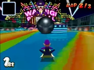 Waluigi racing at Waluigi Pinball in his Shooting Star.