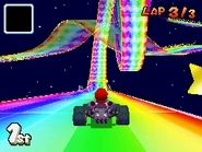 MKDS Rainbow Road Loop.png (22 KB) Mario in his B Dasher racing on Rainbow Road, about to enter the loop.