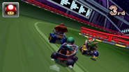 Mii, Donkey Kong and Bowser racing.