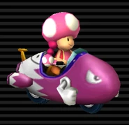 Toadette's Bullet Bike has a magenta complexion with a white rear.