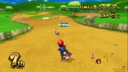 Mario is about to POW Baby Peach and every other racer ahead of him.