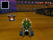 Bowser racing through the track.