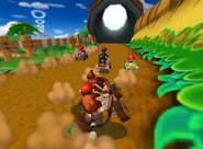 Several racers approach the cannon.