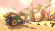 Yoshi racing in the course.
