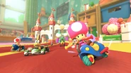 MK8-DLC-Course-GBA RibbonRoad02.jpg (588 KB) Toadette using a Mr. Scooty.
