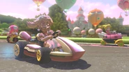 Pink Gold Peach racing with Peach and Toadette.