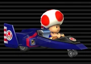 Toad in his Blue Falcon (Mario Kart Wii)