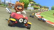 Tanooki Mario driving.jpeg (222 KB) Tanooki Mario driving at Mario Circuit.