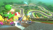 Yoshi, Toad, and Baby Luigi racing on the anti-gravity section of the track's appearance in Mario Kart 8.