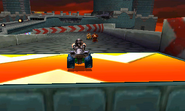 Metal Mario racing on the track.