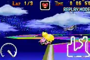 Peach is attempting to take advantage by using the jump pads on the side of the track...