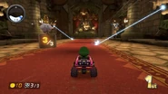 Lasers from the Gray Bowser Statues, which start firing lasers when players usually enter the second lap.