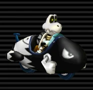 Dry Bones' Bullet Bike has the standard black complexion of the normal Bullet Bill, with a white rear.