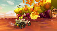 Peach in front of a Wiggler in Maple Treeway in Mario Kart Wii.
