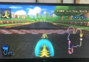  racing in the  version of Mario Circuit.