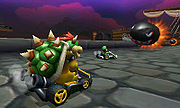 Bowser racing at DS Airship Fortress in Mario Kart 7.