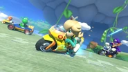 Rosalina racing with Waluigi, Yoshi and Baby Daisy.