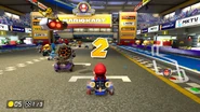 Mario and racers revving up their engines.