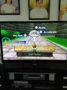 Bowser Jr. racing in the courtyard with Bananas lined up next to him.