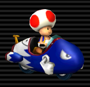 Toad's Bullet Bike has a blue complexion with a white rear.