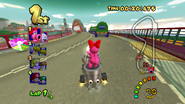 Birdo and King Boo racing at Mushroom Bridge in Mario Kart: Double Dash!!.