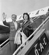 Mark Goodson , TV producer and his bride, the former Virginia McDavid, prepare to a board plane Aug. 17, 1956 for a flight to Europe for a honeymoon.